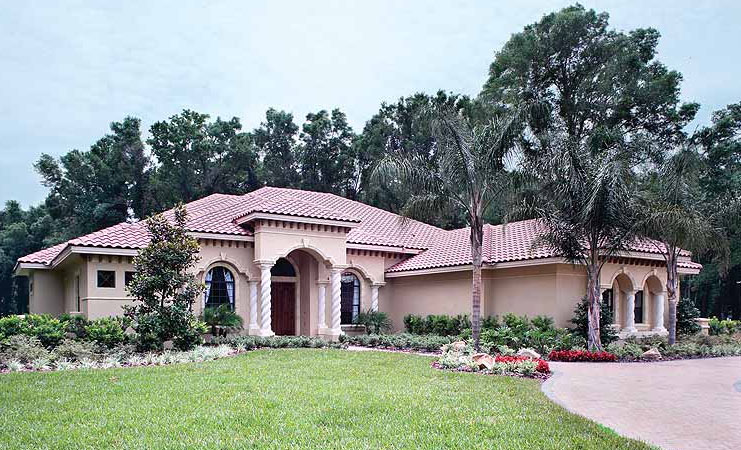 Mediterranean custom home exterior by Savuti Group LLC
